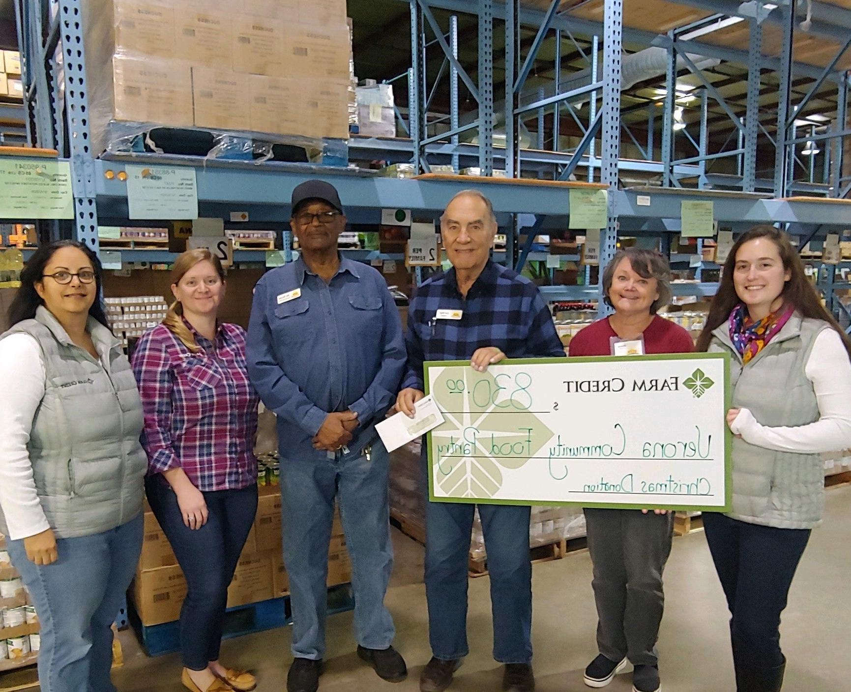 verona community food pantry check presentation farm credit